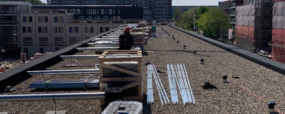 Poortmeester-Delft-PVT-panelen-hijsen-bron-warmtepomp-appartementen-woningen-Ballast-Nedam-Triple-Solar-02